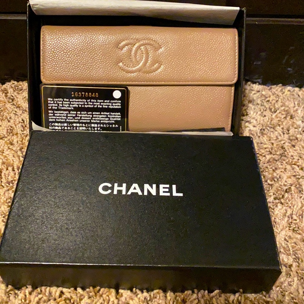 Chanel trifold caviar  leather wallet.